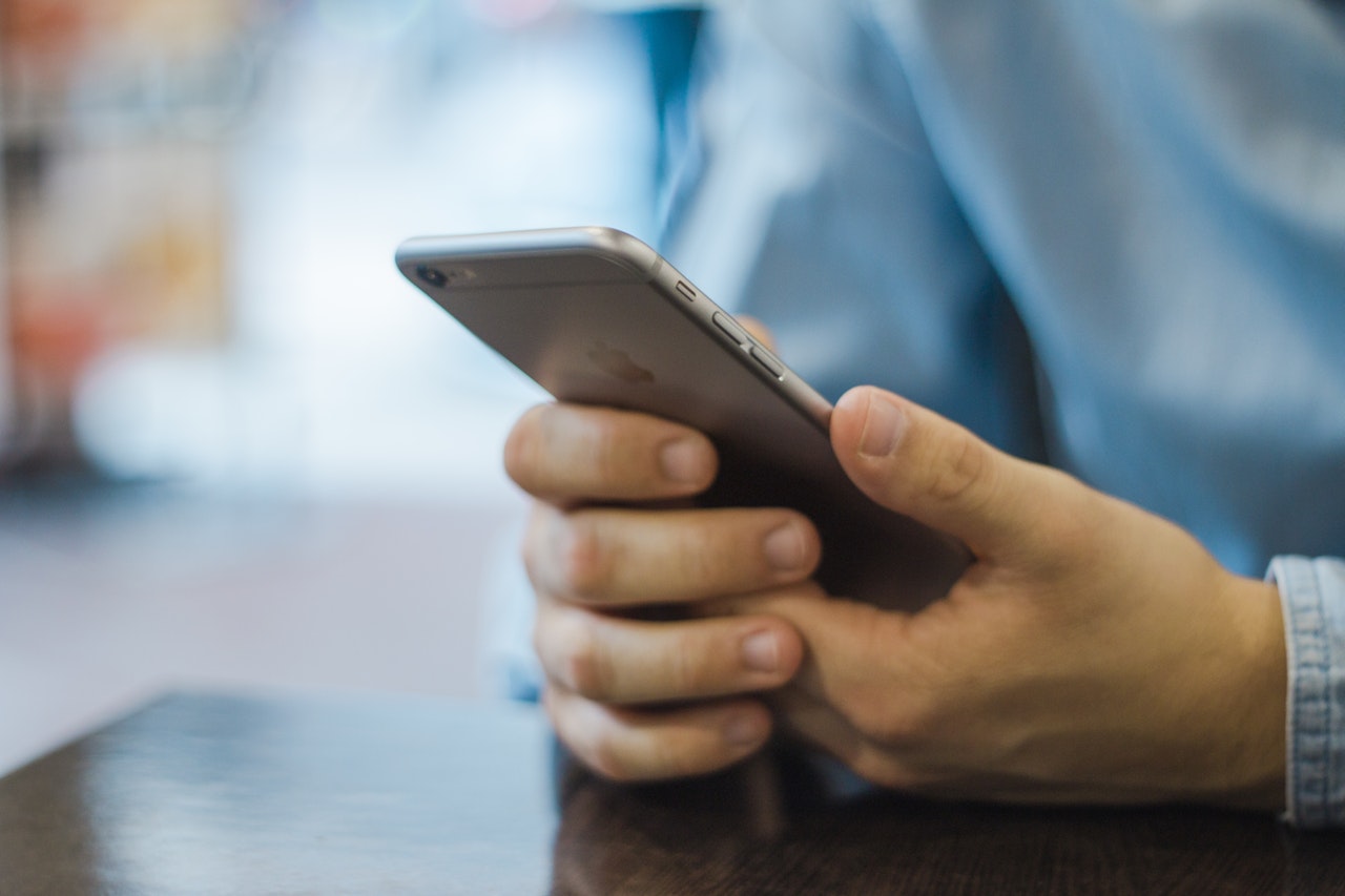 man holding an iPhone